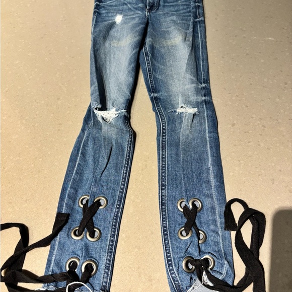 Express Denim - NWOT EXPRESS Women's Blue Distressed Jeans with Lace-Up Detail Size 00 Regular